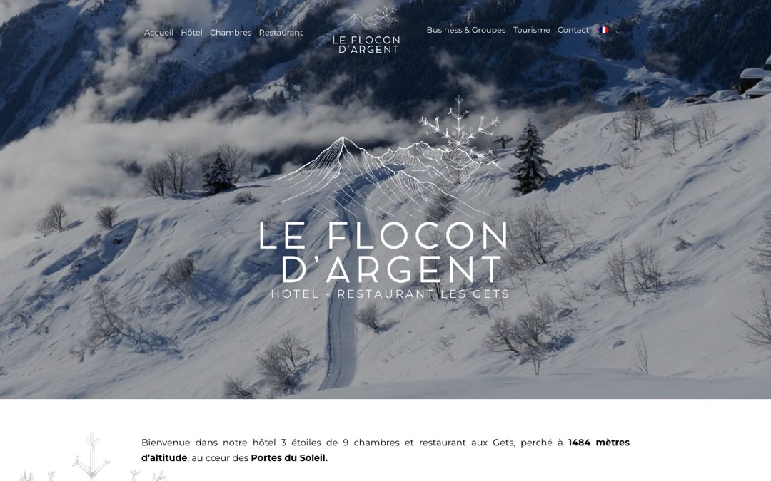 Accueil du site du Flocon d’Argent, aux Gets : photo d’une piste de ski enneigée, menu avec Hôtel, Chambres, Restaurant, Business & Groupes et Tourisme