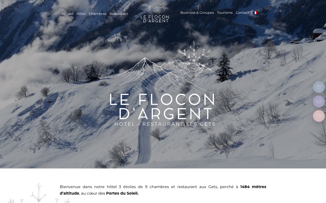 Accueil du site du Flocon d’Argent : photo plein écran de la montagne enneigée, logo blanc et mention « Hôtel – Restaurant Les Gets »