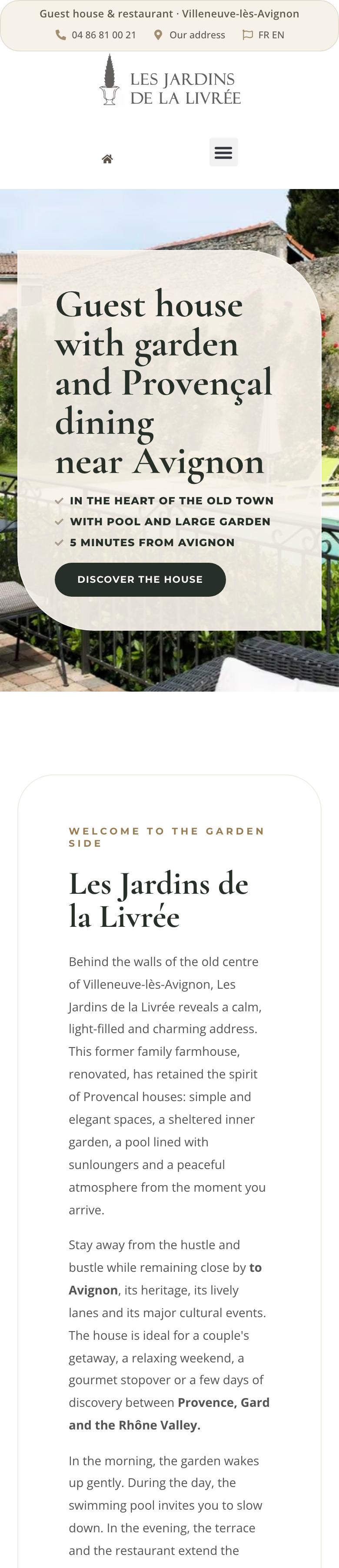 Phone view of the Les Jardins de la Livrée home page: a top bar with the phone number and address link, the logo and menu icon, and a photo with the card Guest house with garden and Provençal dining near Avignon
