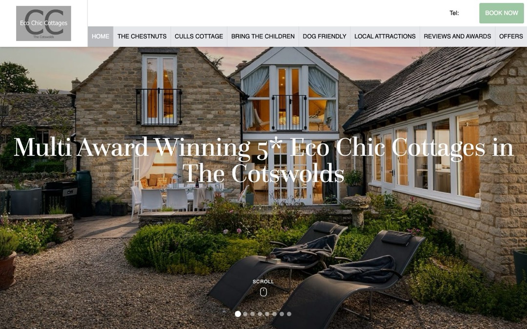 Stone cottage terrace with loungers and a garden in the Cotswolds, the opening photo of the Eco Chic Cottages website